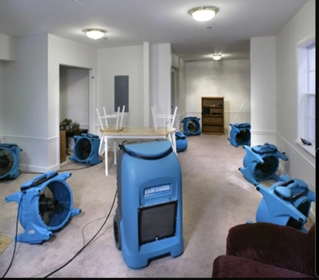 Air movers and dehumidifier setup for Water Damage Restoration in Henderson